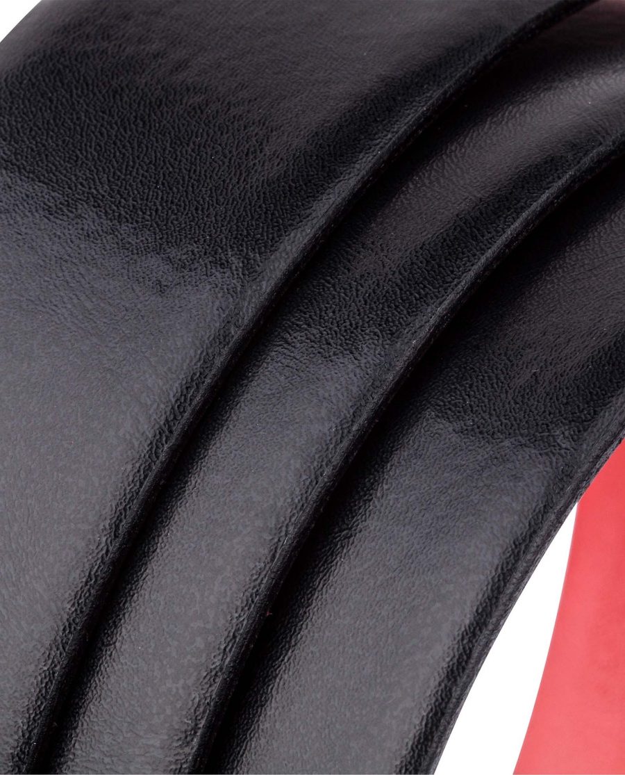 Black-Red-Ratchet-Belt-Rolled-strap