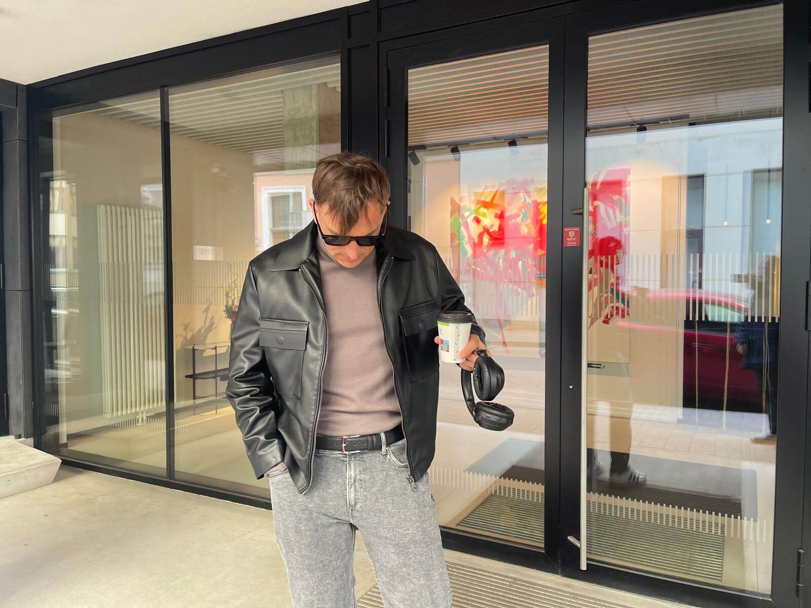 Saffiano leather belt on man with coffee in the city